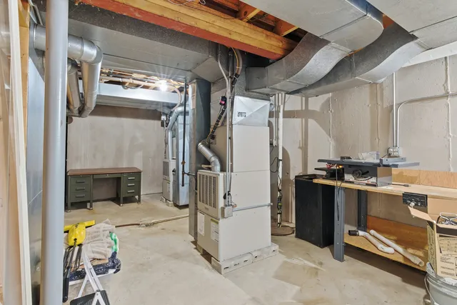 an aerial view of a house with swimming pool outdoor seating and yard
