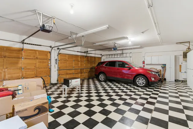an aerial view of a house with swimming pool yard and outdoor seating