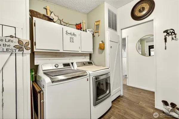 a utility room with dryer and washer