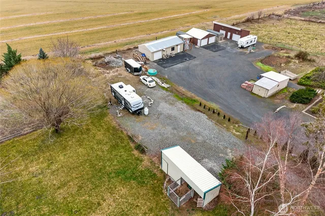 a view of a lake with houses in the back