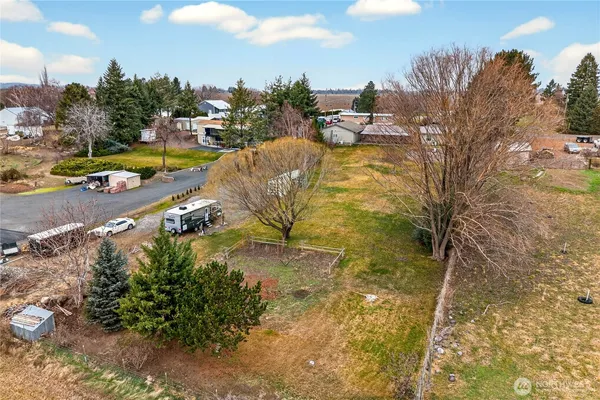 an aerial view of residential house with outdoor space