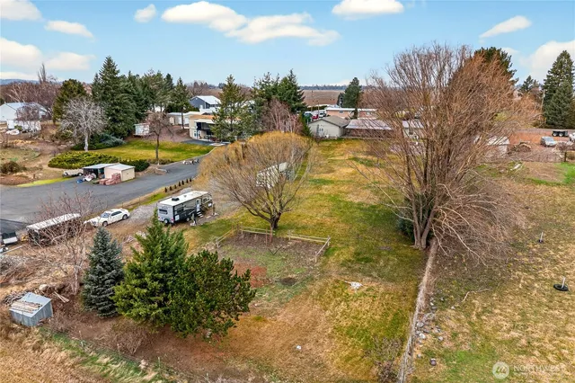 an aerial view of residential house with outdoor space