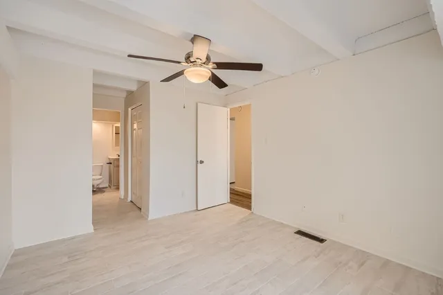 a view of an empty room and window