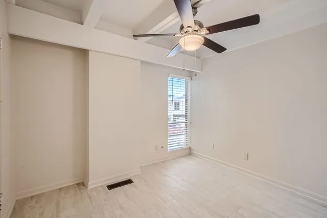 a view of small space with racks on the wall