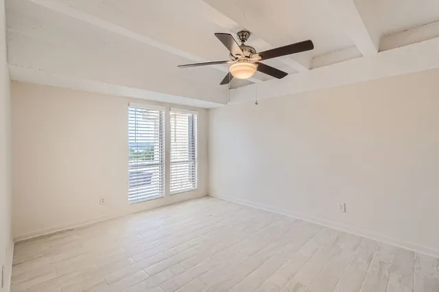 an outdoor space with lounge chair