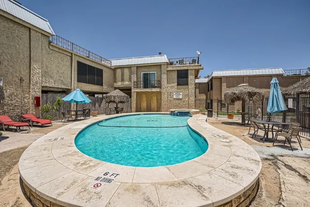 a view of a chairs and table on the terrace