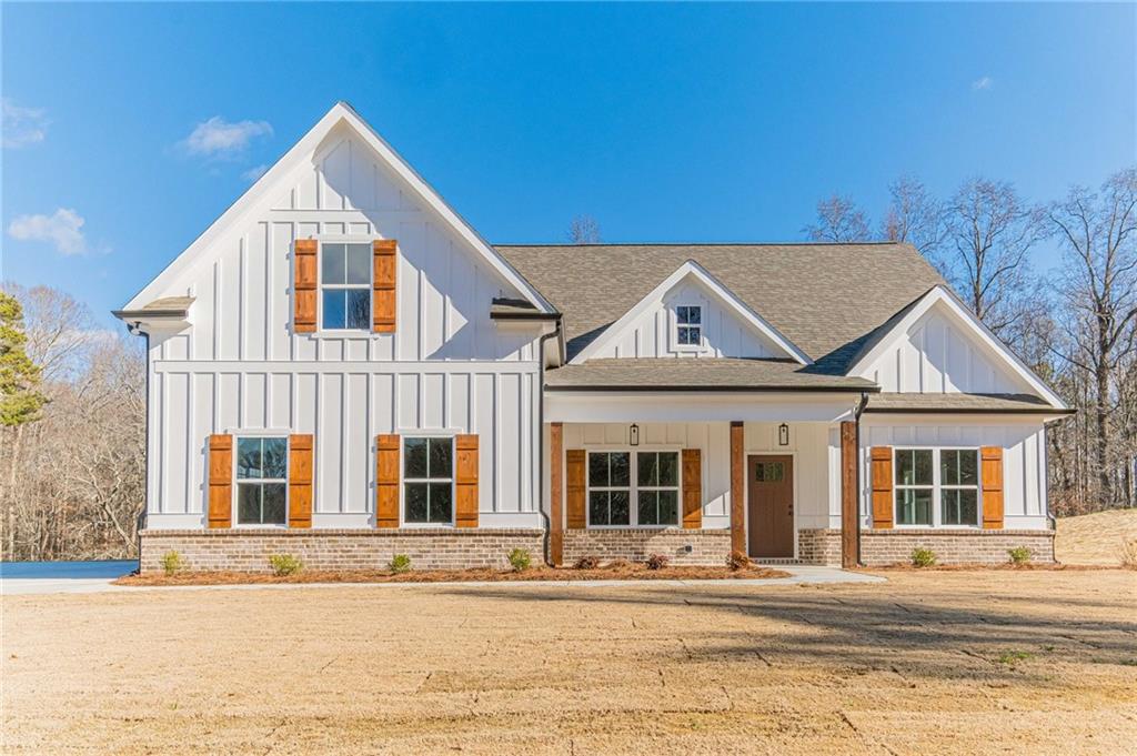 front view of a house with a yard
