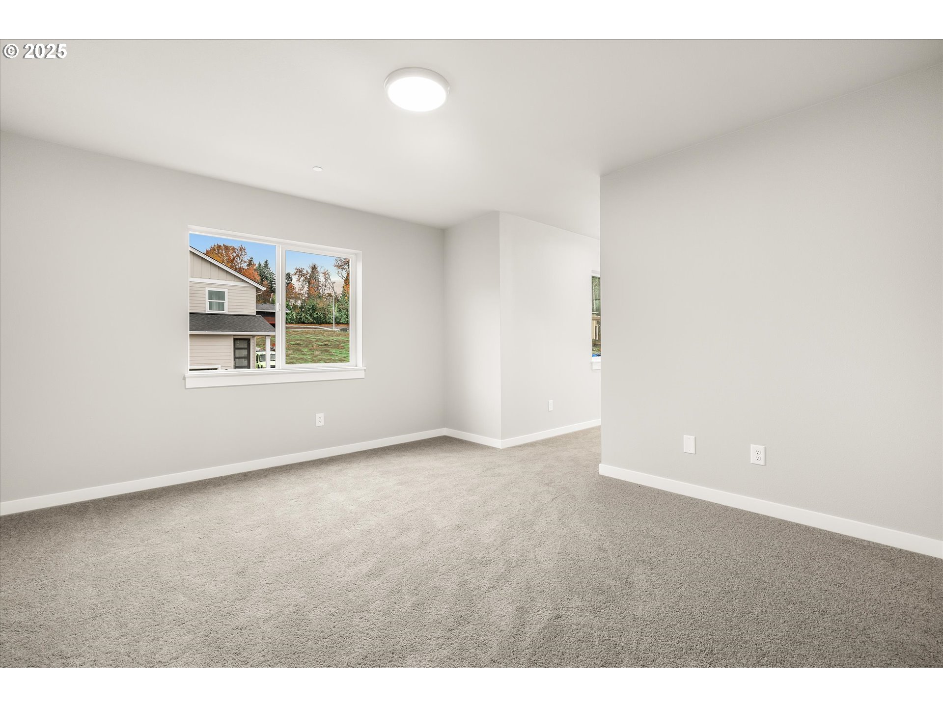 181 Southwest Mawrcrest Avenue Gresham, OR 97030 - Photo 28 of 37 a view of an empty room with a window