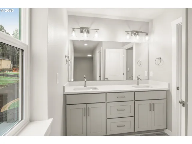 a bathroom with a shower and a toilet