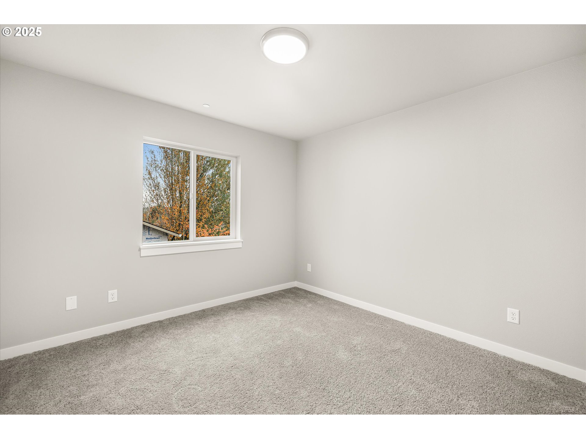 181 Southwest Mawrcrest Avenue Gresham, OR 97030 - Photo 33 of 37 a view of an empty room with a window