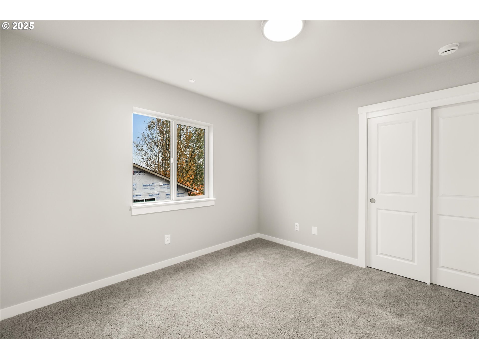181 Southwest Mawrcrest Avenue Gresham, OR 97030 - Photo 34 of 37 a view of an empty room with a window