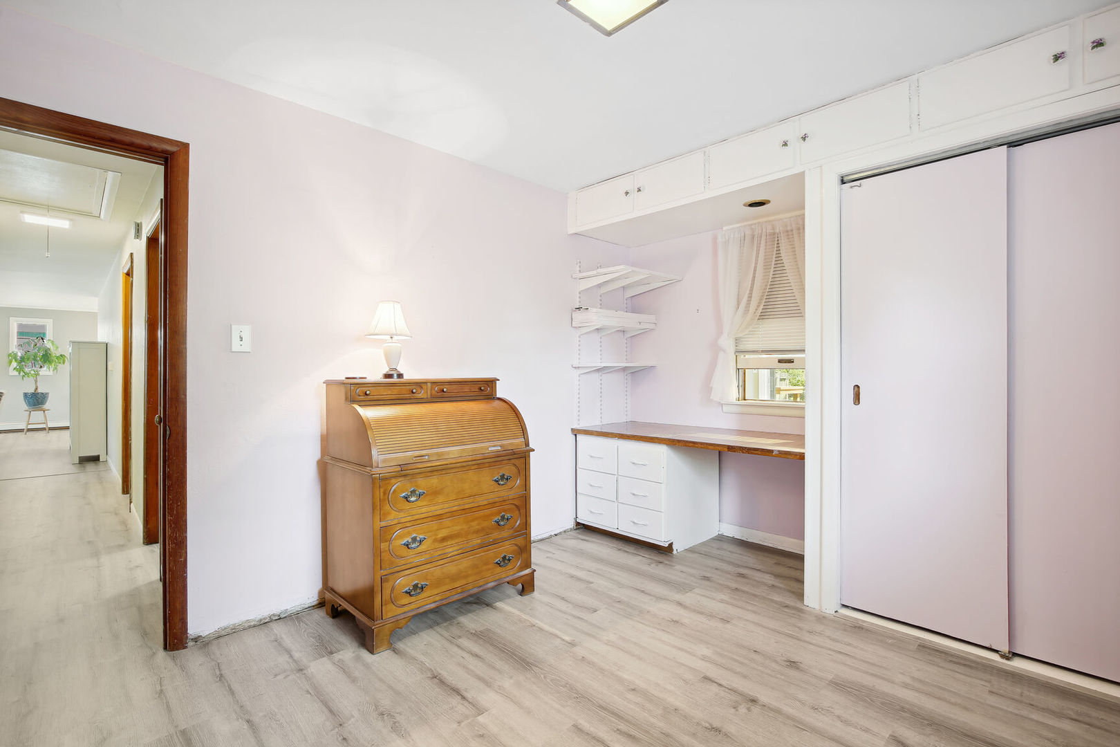 1008 South Mattis Avenue Champaign, IL 61821 - Photo 18 of 25 a view of walk in closet with wooden floor