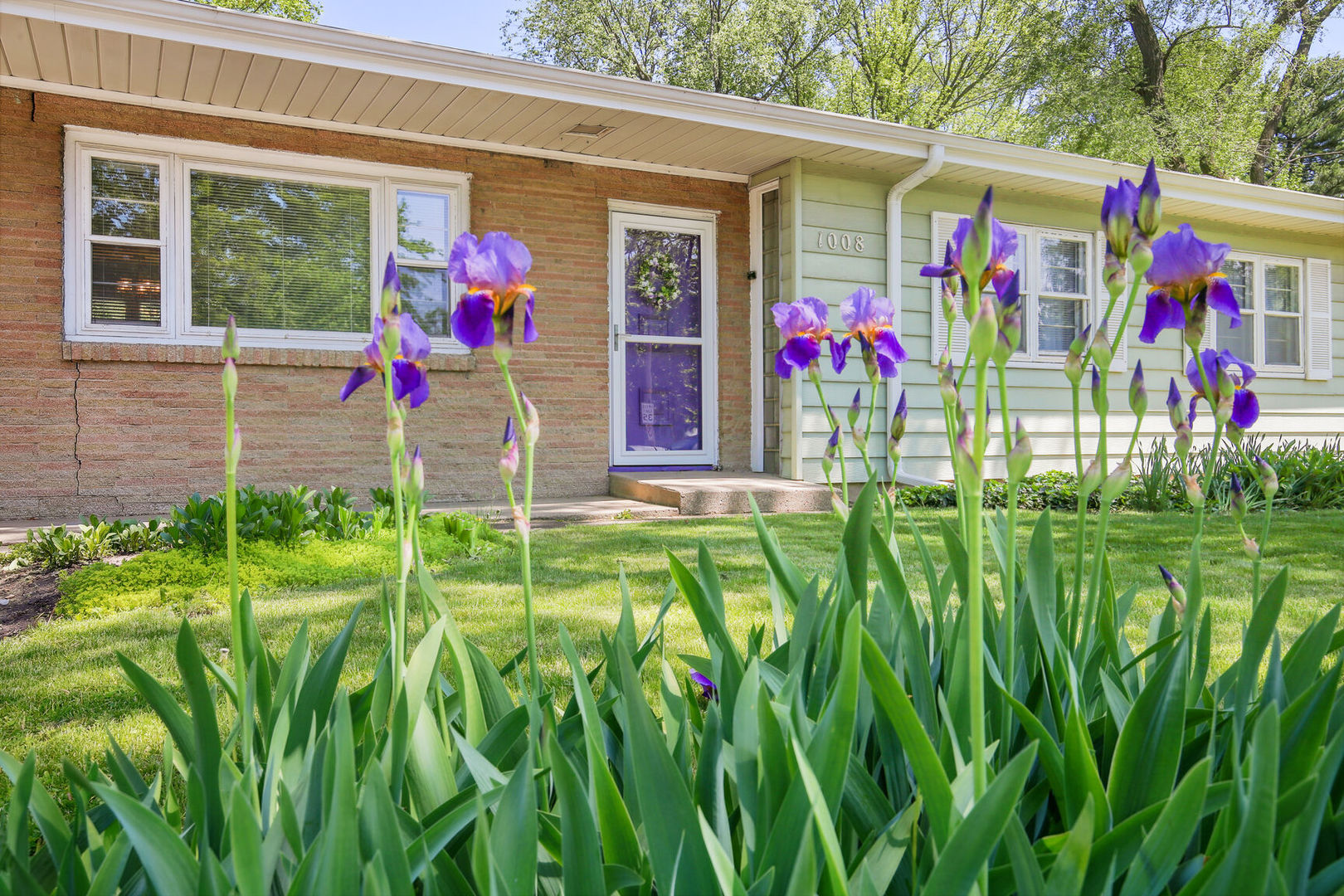 1008 South Mattis Avenue Champaign, IL 61821 - Photo 2 of 25 a view of front door of house with outdoor seating