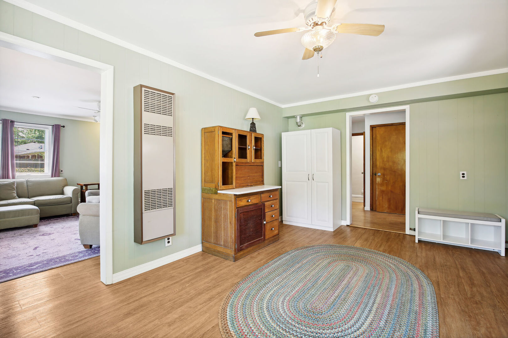 1008 South Mattis Avenue Champaign, IL 61821 - Photo 22 of 25 a spacious bedroom with a bed and a chandelier