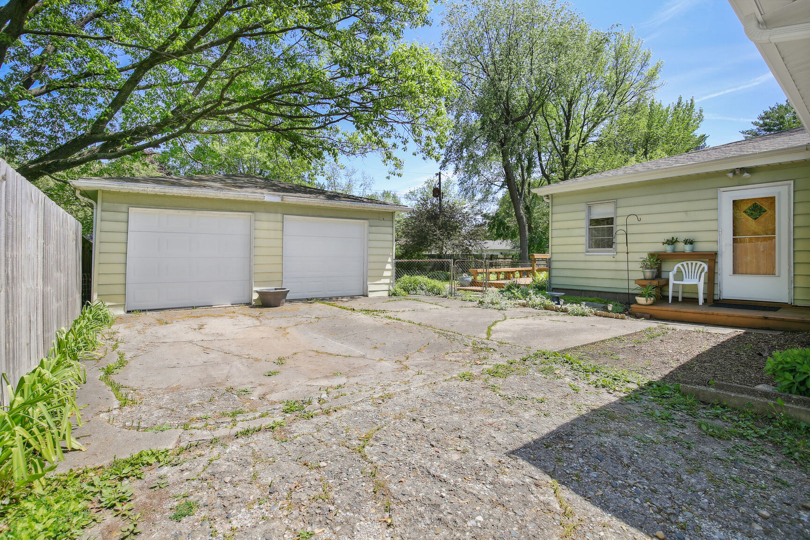 1008 South Mattis Avenue Champaign, IL 61821 - Photo 23 of 25 a front view of house with yard and trees in the background