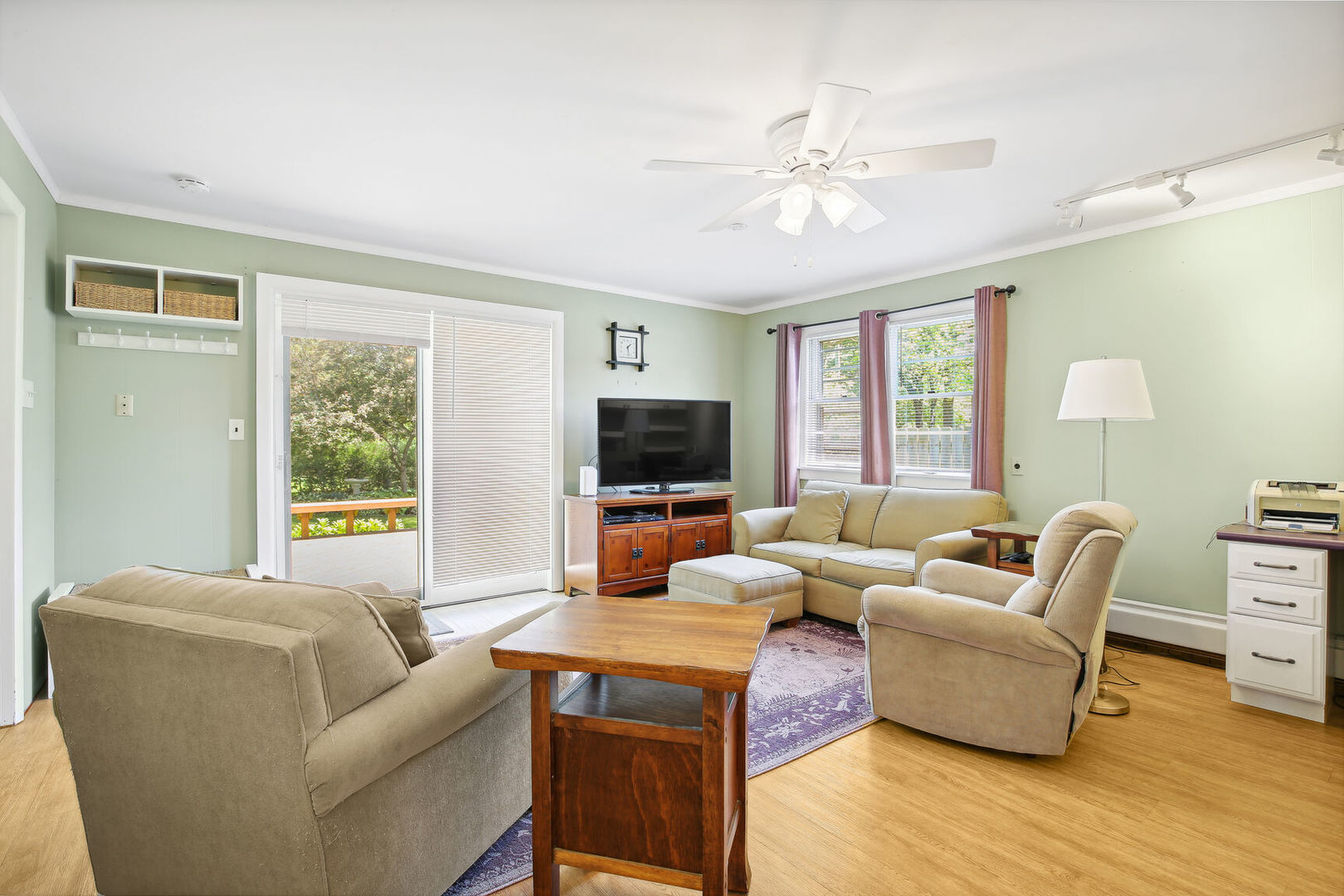 1008 South Mattis Avenue Champaign, IL 61821 - Photo 8 of 25 a living room with furniture and a flat screen tv