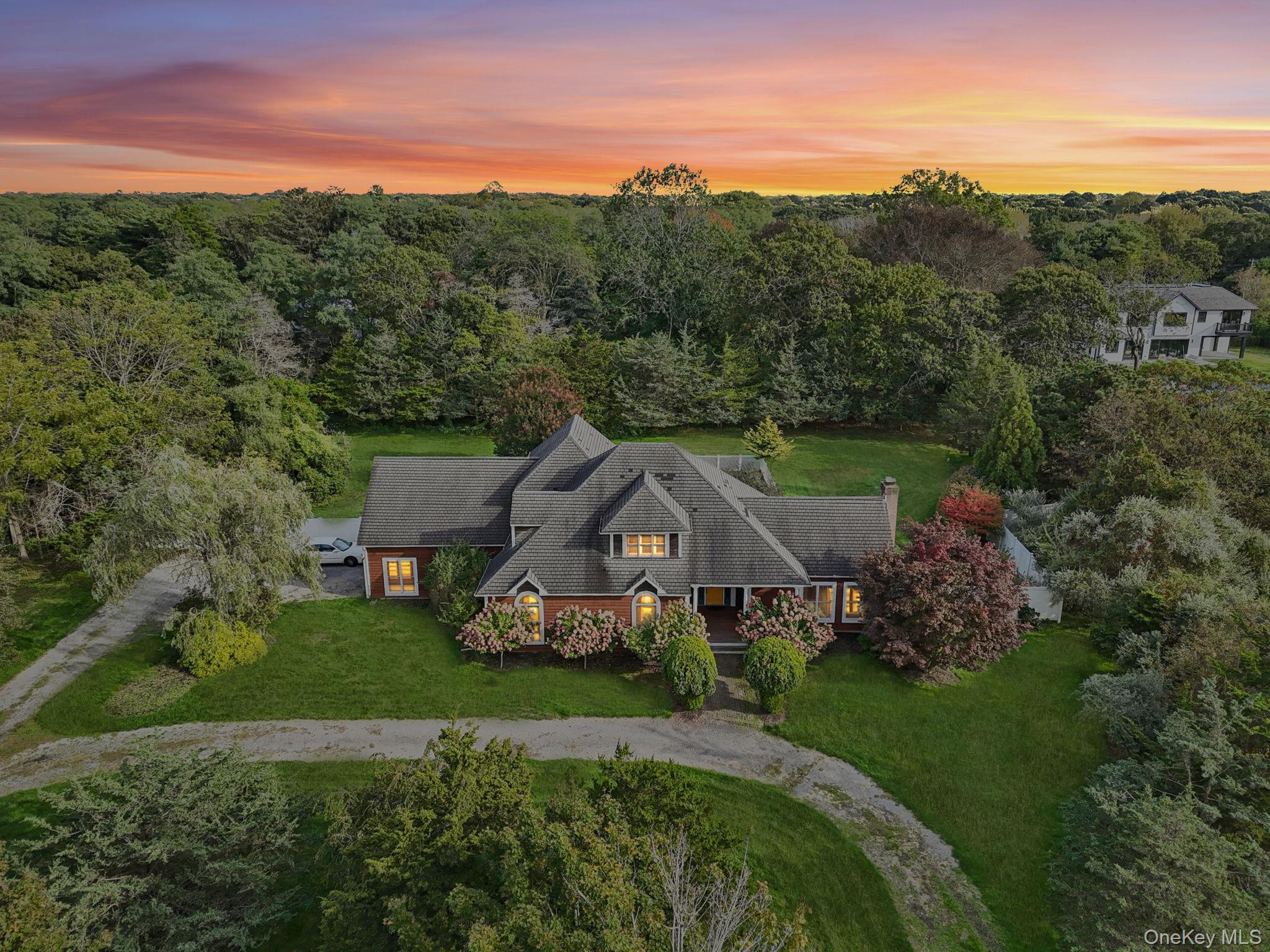 12 Laila Lane Remsenburg, NY 11960 - Photo 48 of 50 an aerial view of a house with mountain view