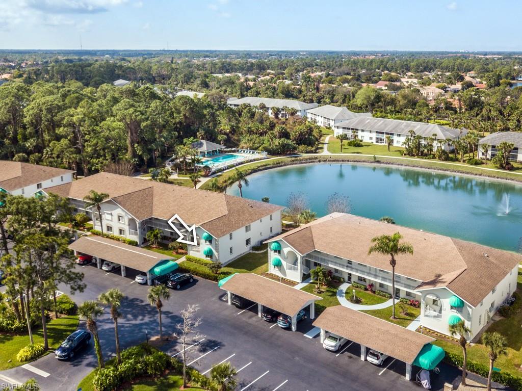 an aerial view of a house with a ocean view