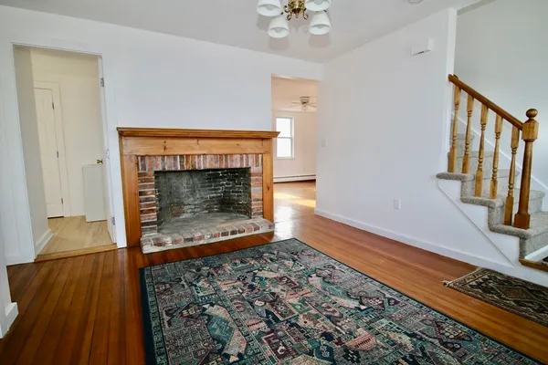 a living room with a fireplace