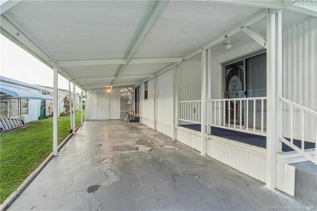 4800 Southeast Federal Highway, Unit 72 Stuart, FL 34997 - Photo 4 of 22 a view of a porch