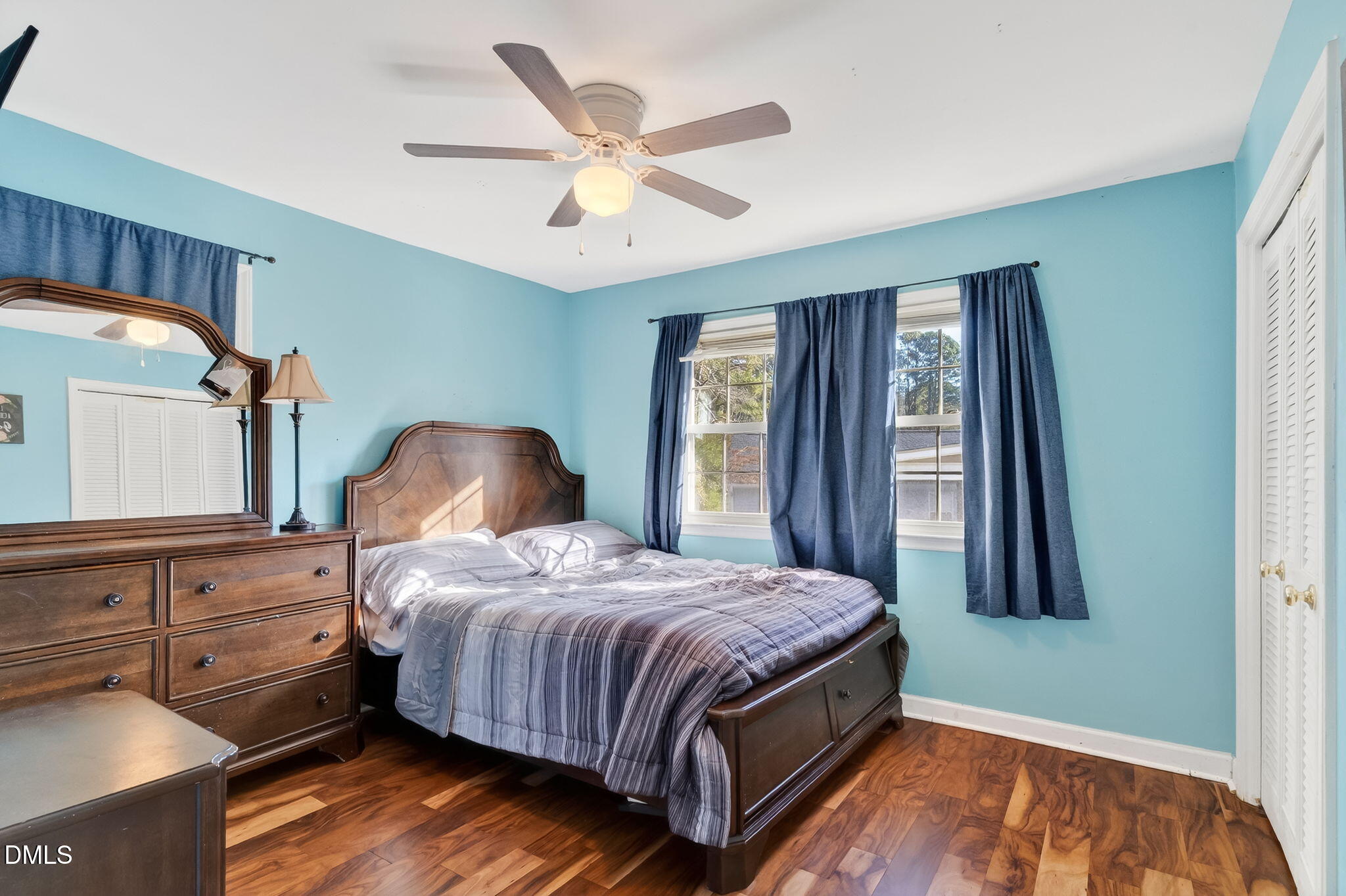6201 Barrington Village Lane Raleigh, NC 27610 - Photo 14 of 25 a bedroom with a bed and window