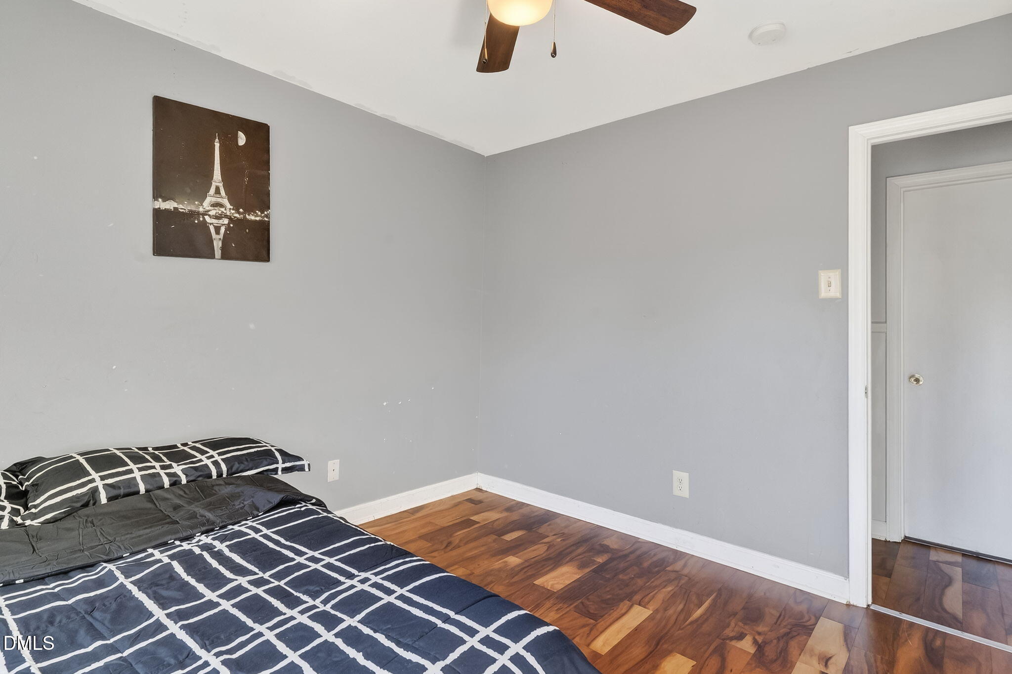 6201 Barrington Village Lane Raleigh, NC 27610 - Photo 19 of 25 a bedroom with a bed and a window