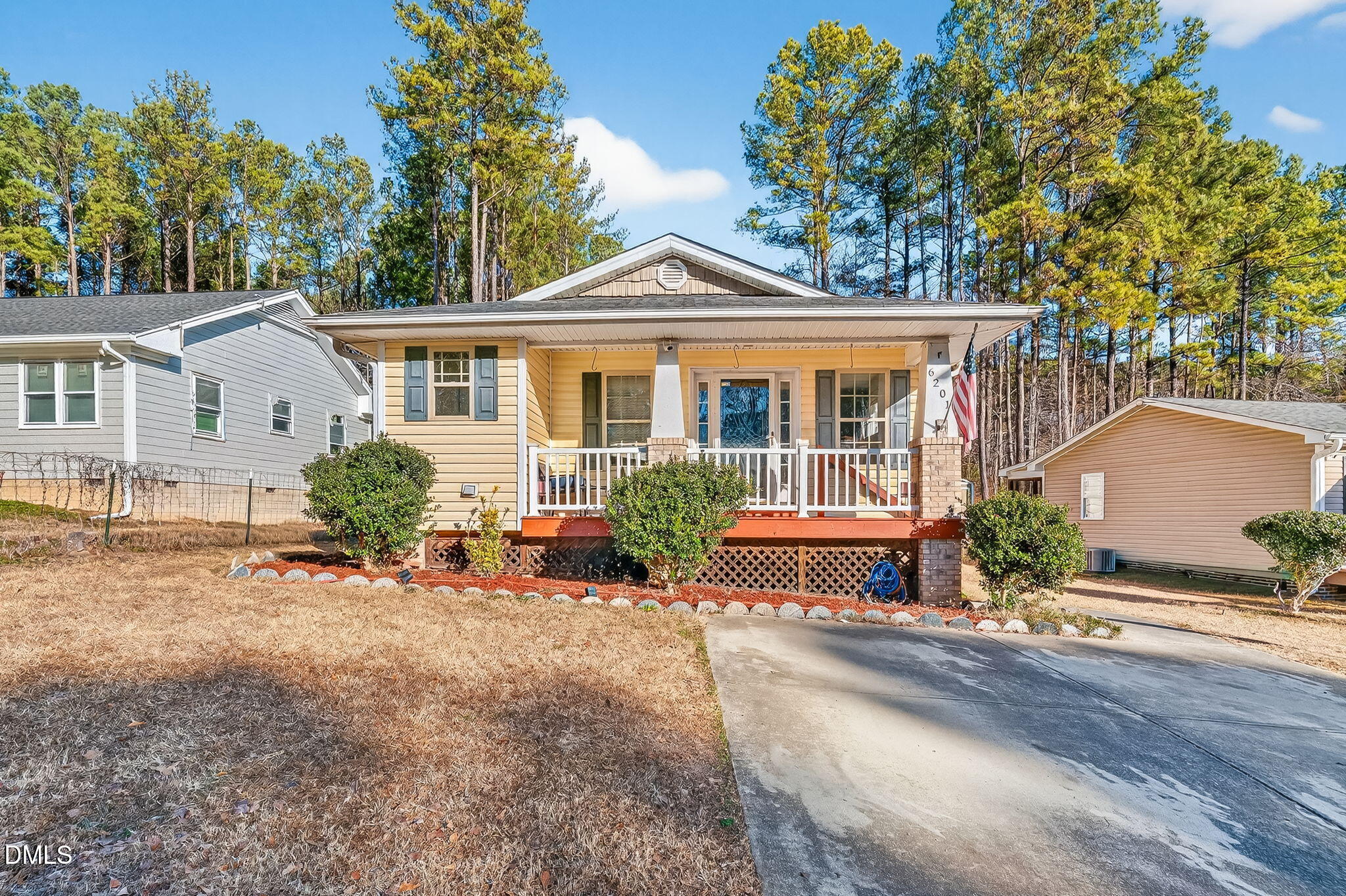 6201 Barrington Village Lane Raleigh, NC 27610 - Photo 2 of 25 front view of a house with a patio