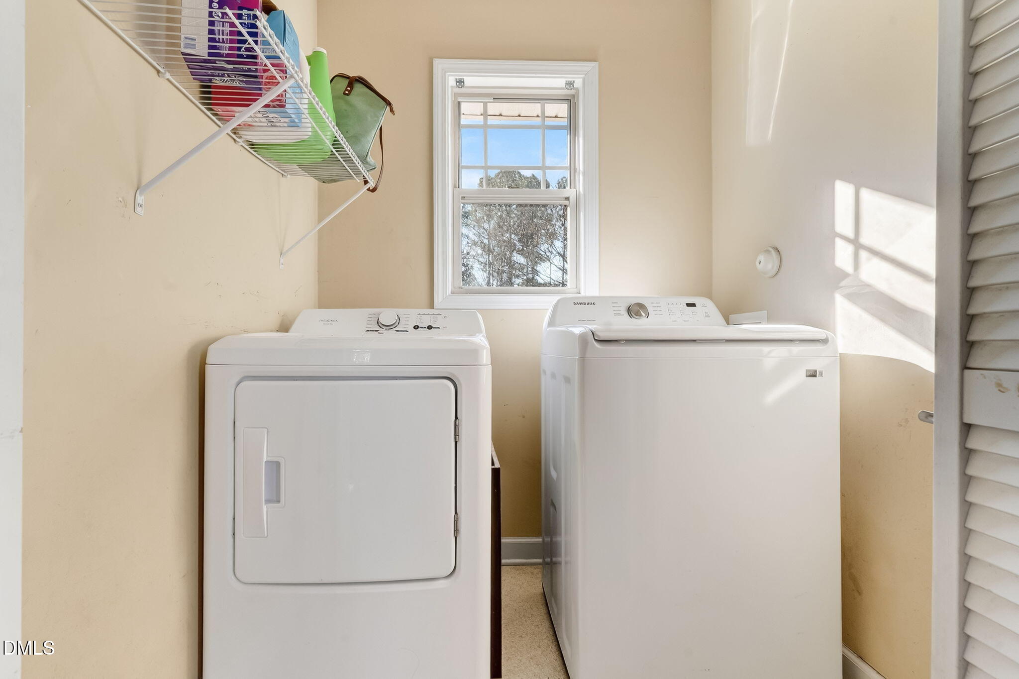 6201 Barrington Village Lane Raleigh, NC 27610 - Photo 22 of 25 a utility room with dryer and washer