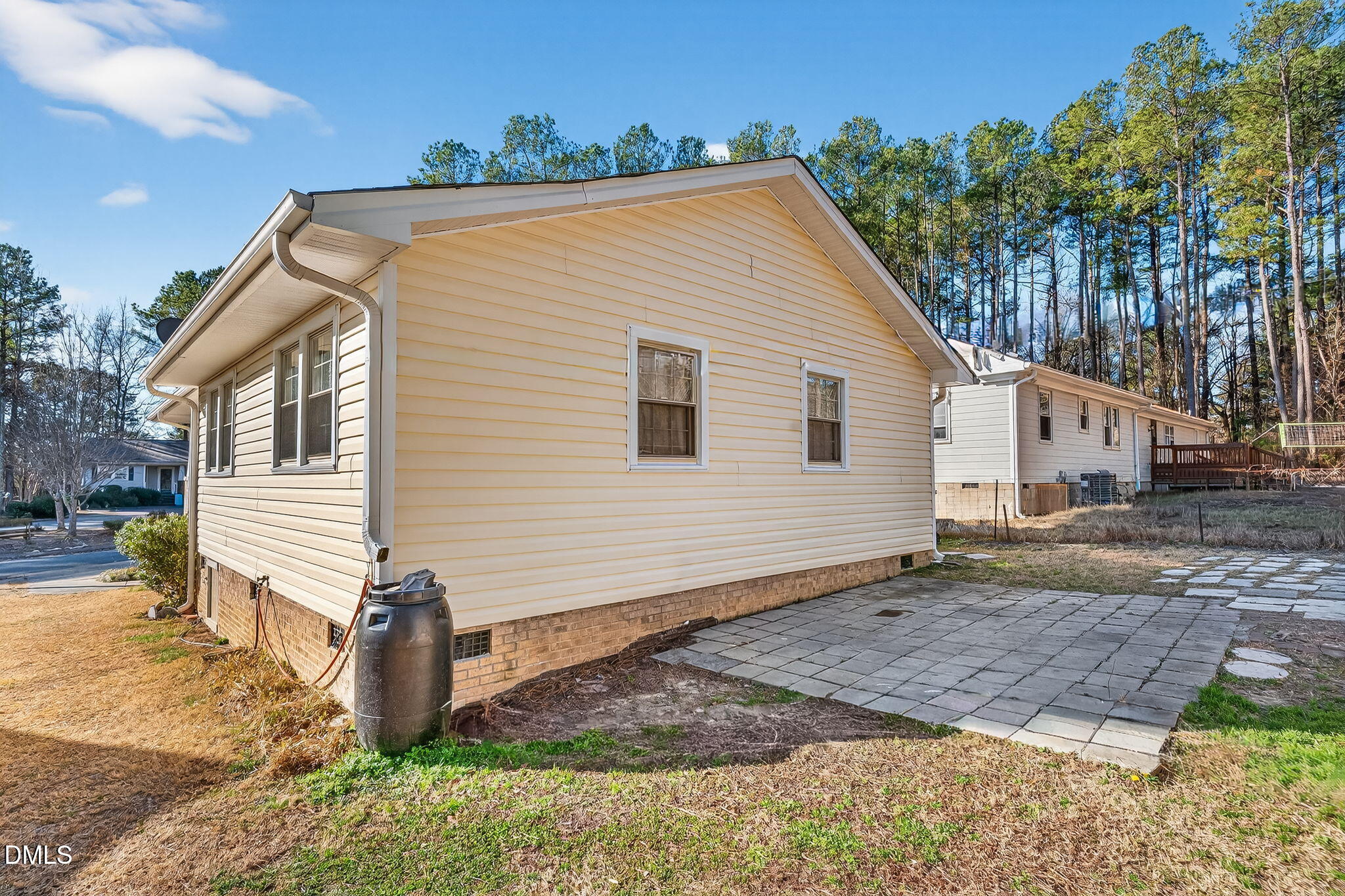 6201 Barrington Village Lane Raleigh, NC 27610 - Photo 23 of 25 a view of a house with a yard