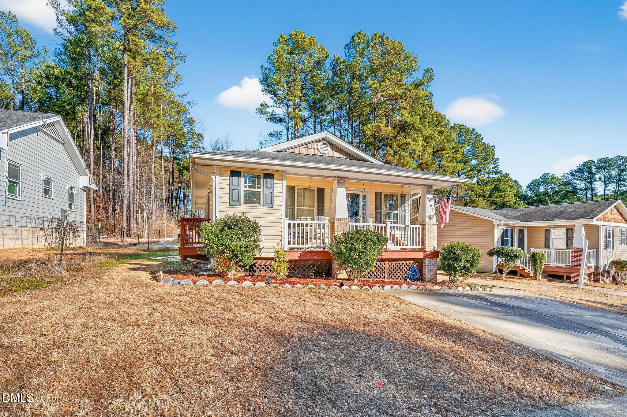 6201 Barrington Village Lane Raleigh, NC 27610 - Photo 3 of 25 a front view of a house with a porch