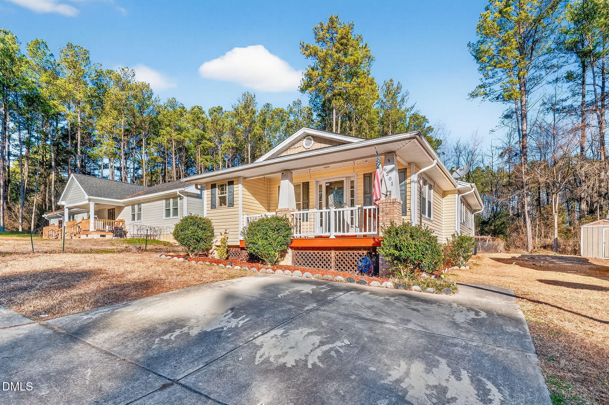 6201 Barrington Village Lane Raleigh, NC 27610 - Photo 4 of 25 a front view of a house with a yard