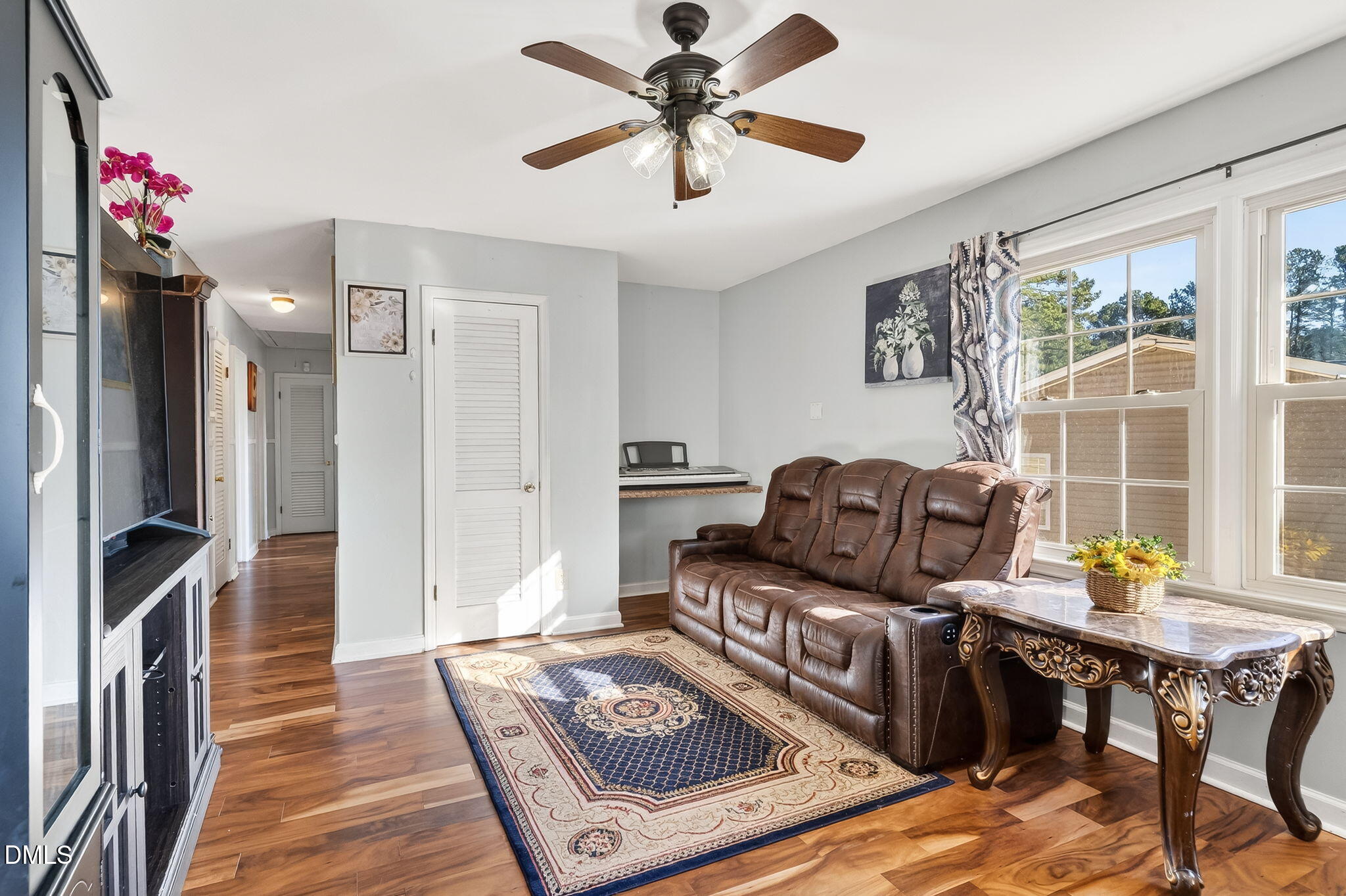 6201 Barrington Village Lane Raleigh, NC 27610 - Photo 7 of 25 a living room with furniture and a window