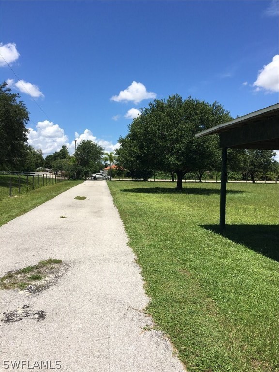 11731 Shawnee Road Fort Myers, FL 33913 - Photo 15 of 20 a view of a golf course with a lake