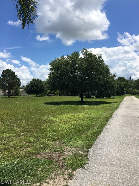 11731 Shawnee Road Fort Myers, FL 33913 - Photo 8 of 20 a view of a golf course with a garden