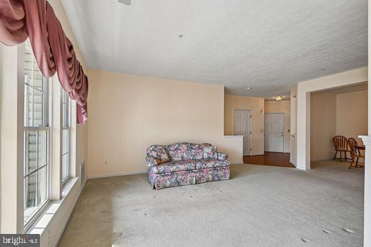 9511 Kingscroft Terrace, Unit 9511F Perry Hall, MD 21128 - Photo 16 of 38 a view of livingroom with furniture