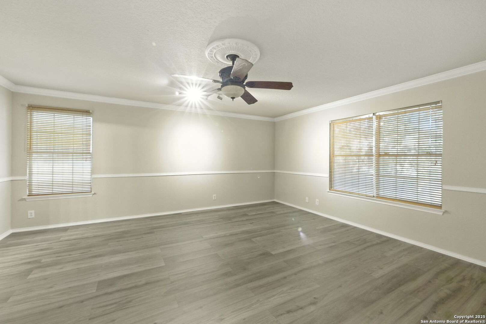 506 Leafy Ridge San Antonio, TX 78251 - Photo 14 of 48 wooden floor in an empty room with a window