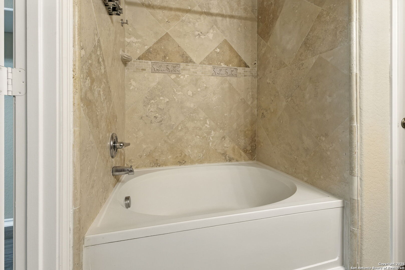 506 Leafy Ridge San Antonio, TX 78251 - Photo 18 of 48 a white bath tub sitting next to a white sink and vanity