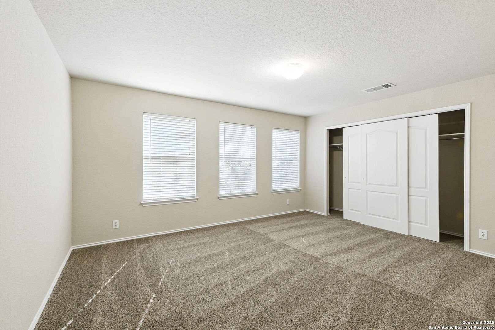506 Leafy Ridge San Antonio, TX 78251 - Photo 27 of 48 a view of an empty room with a window