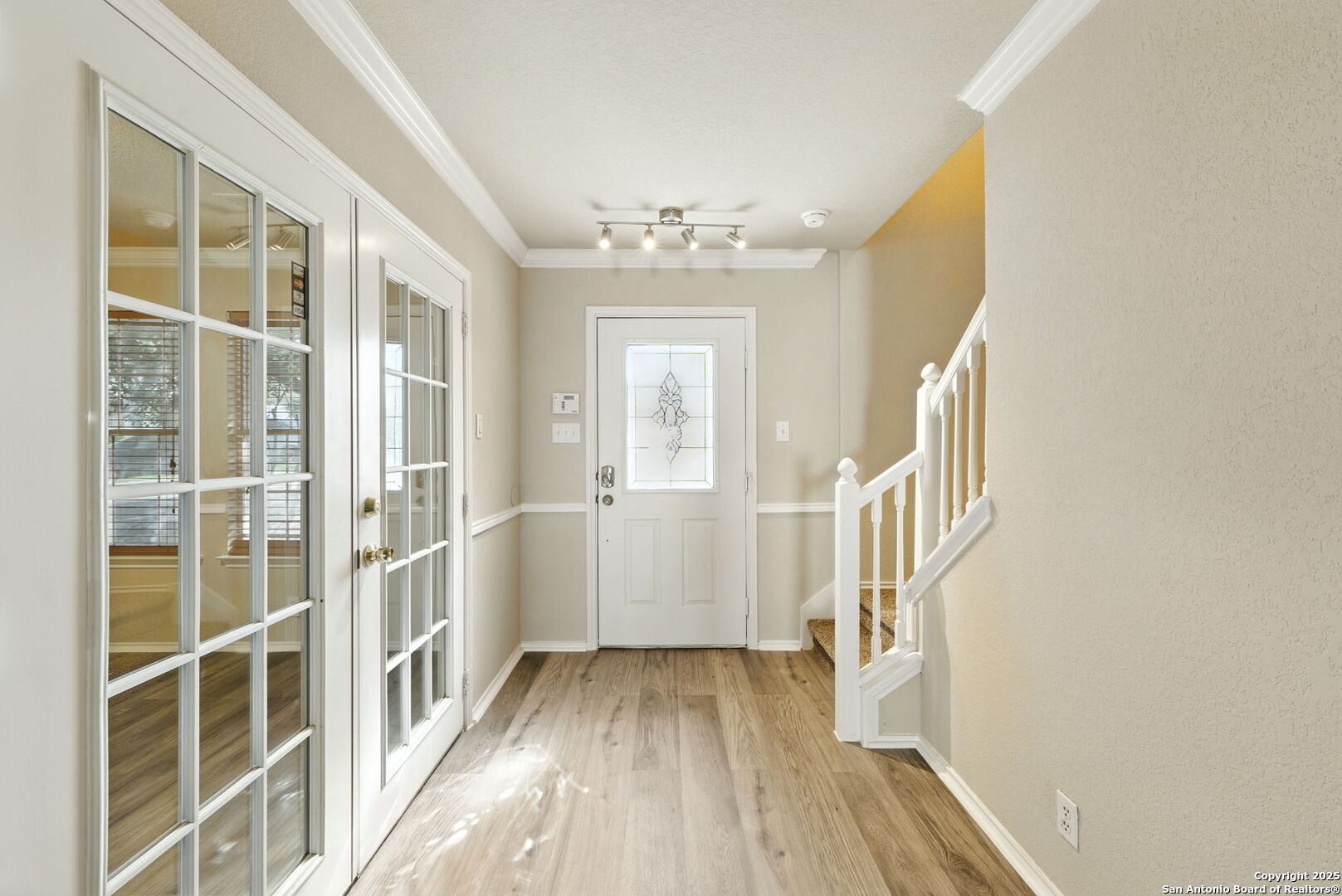 506 Leafy Ridge San Antonio, TX 78251 - Photo 3 of 48 a view of a room with wooden floor and windows