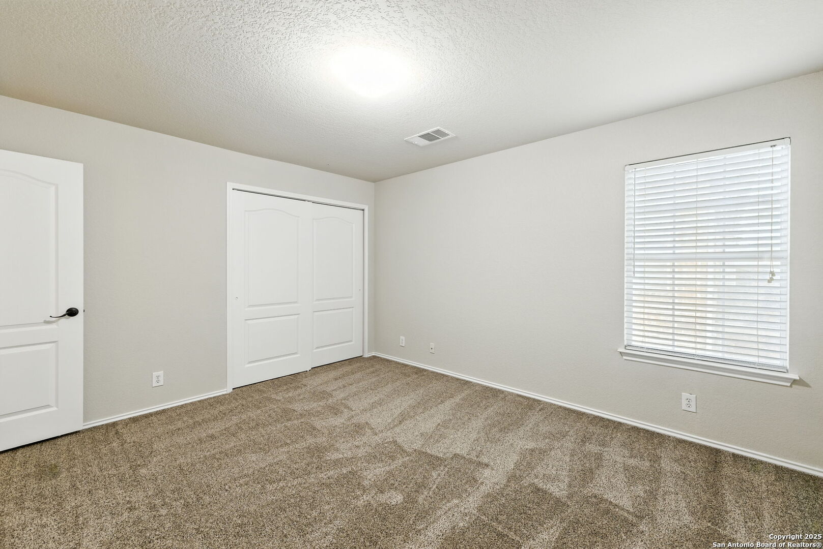506 Leafy Ridge San Antonio, TX 78251 - Photo 33 of 48 an empty room with a window