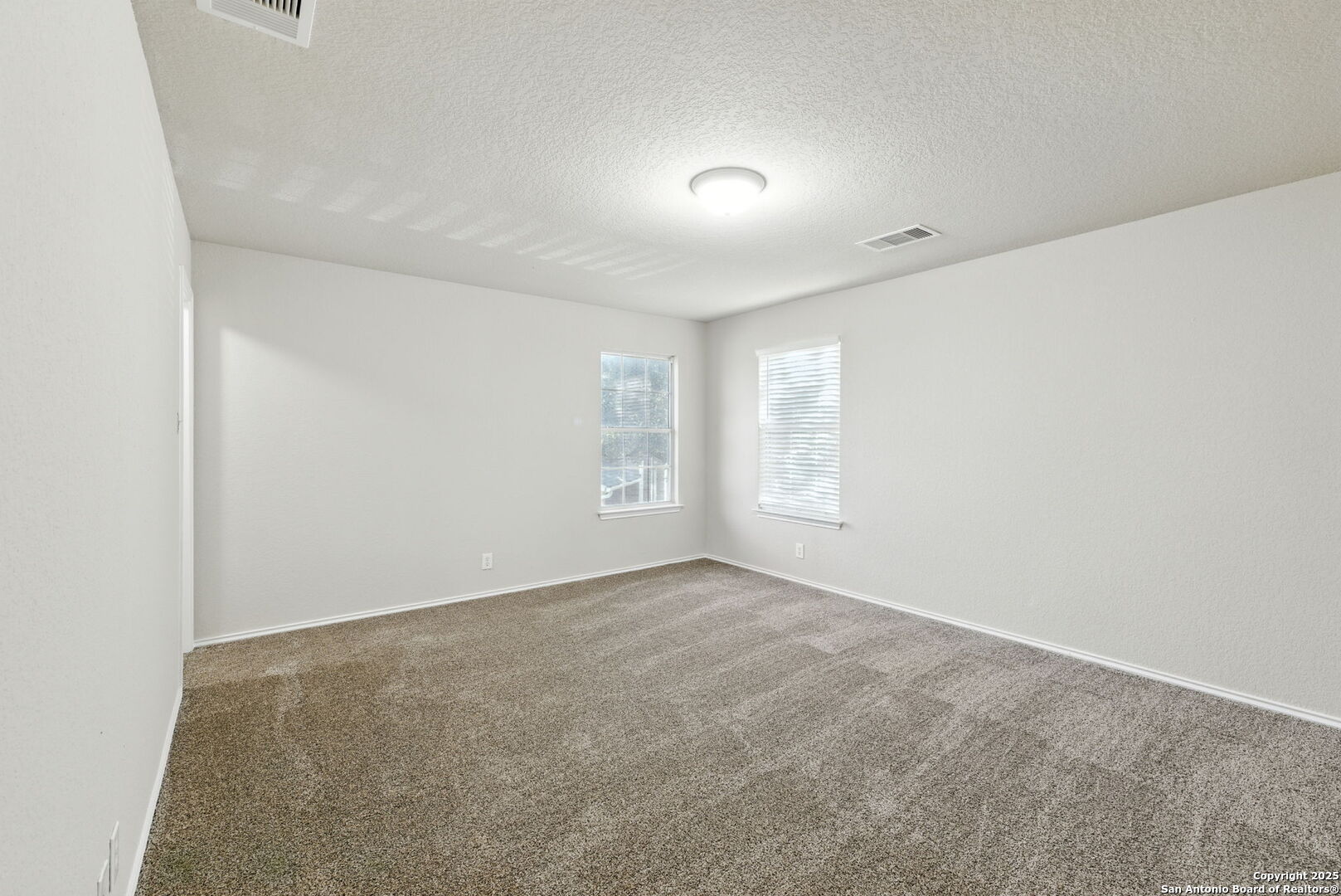 506 Leafy Ridge San Antonio, TX 78251 - Photo 39 of 48 an empty room with windows