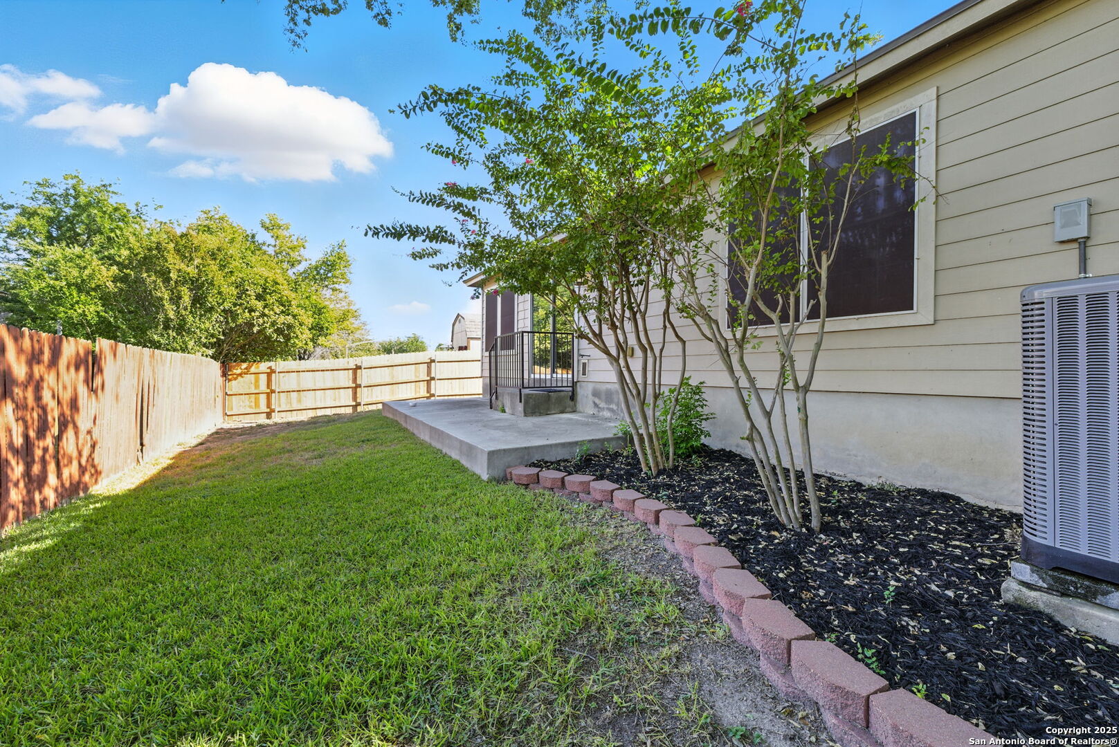 506 Leafy Ridge San Antonio, TX 78251 - Photo 42 of 48 a view of a backyard with wooden fence