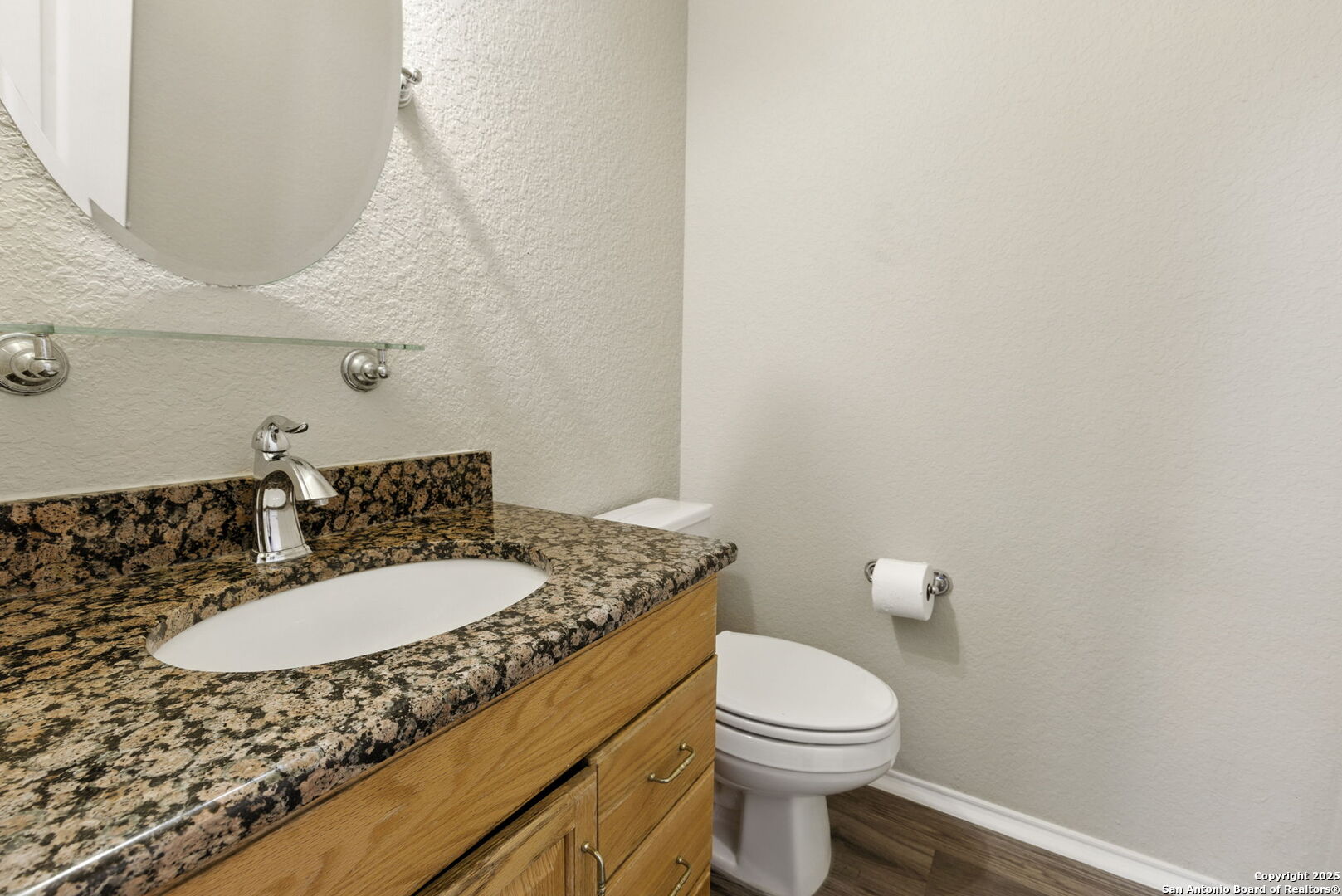 506 Leafy Ridge San Antonio, TX 78251 - Photo 9 of 48 a bathroom with a granite countertop sink and a mirror