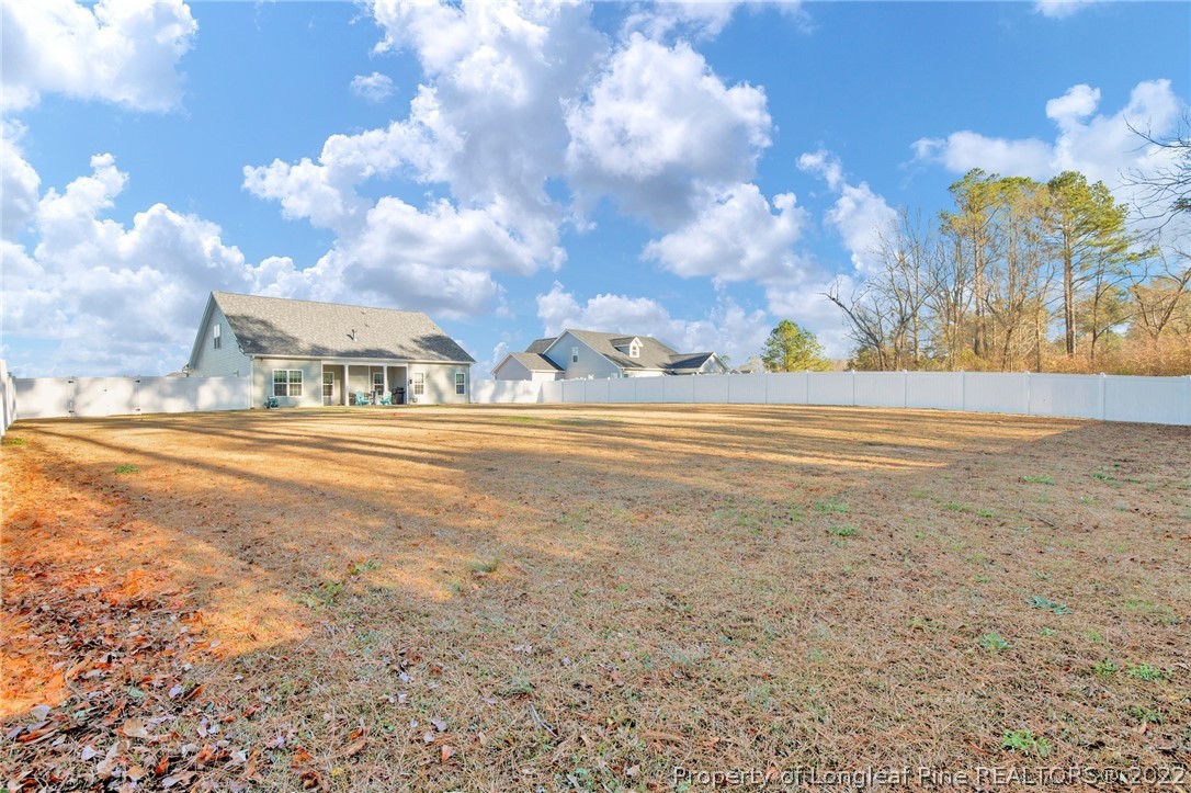2624 Riddle Farm Road Hope Mills, NC 28348 - Photo 30 of 33 a view of a houses with a yard