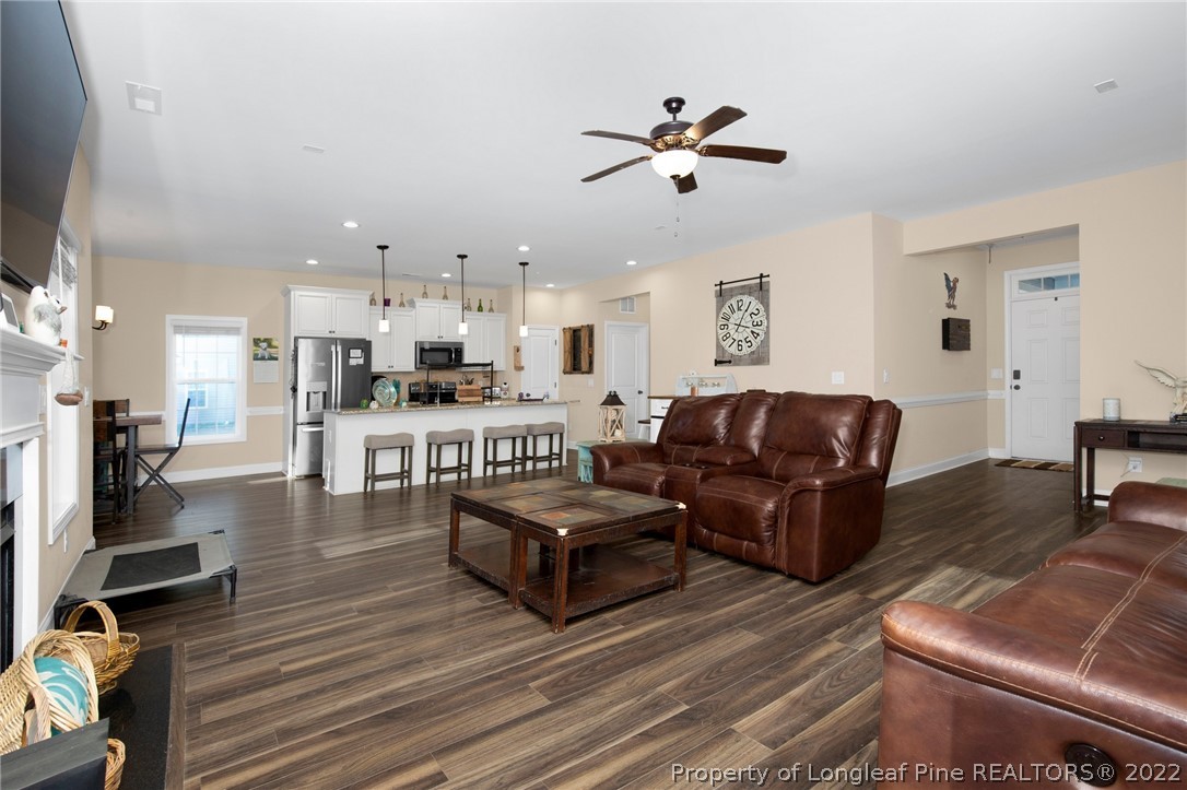 2624 Riddle Farm Road Hope Mills, NC 28348 - Photo 8 of 33 a living room with furniture and kitchen view