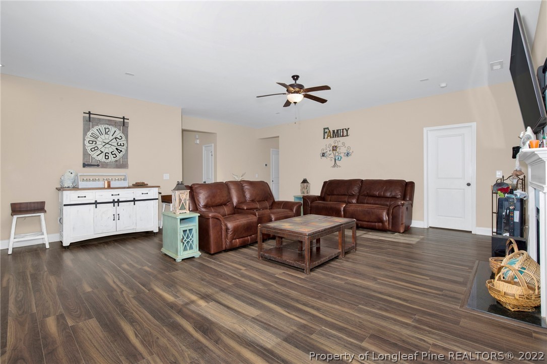 2624 Riddle Farm Road Hope Mills, NC 28348 - Photo 9 of 33 a living room with furniture and a flat screen tv
