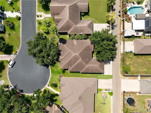 an aerial view of residential building and ocean
