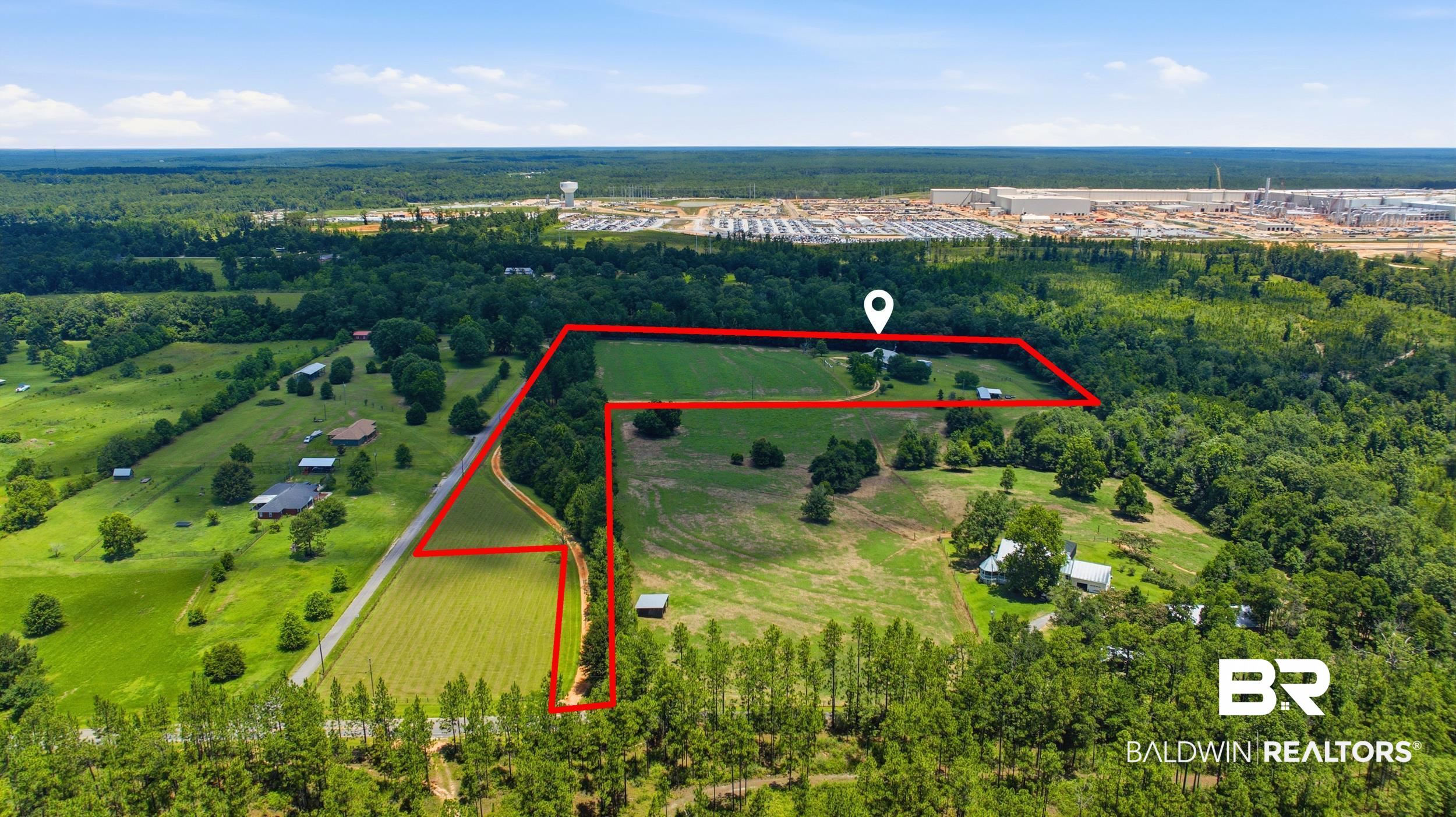 15855 Calvin Richerson Road Bay Minette, AL 36507 - Photo 78 of 83 Expansive rural property featuring a mix of cleared pasture, wooded areas, and agricultural fields