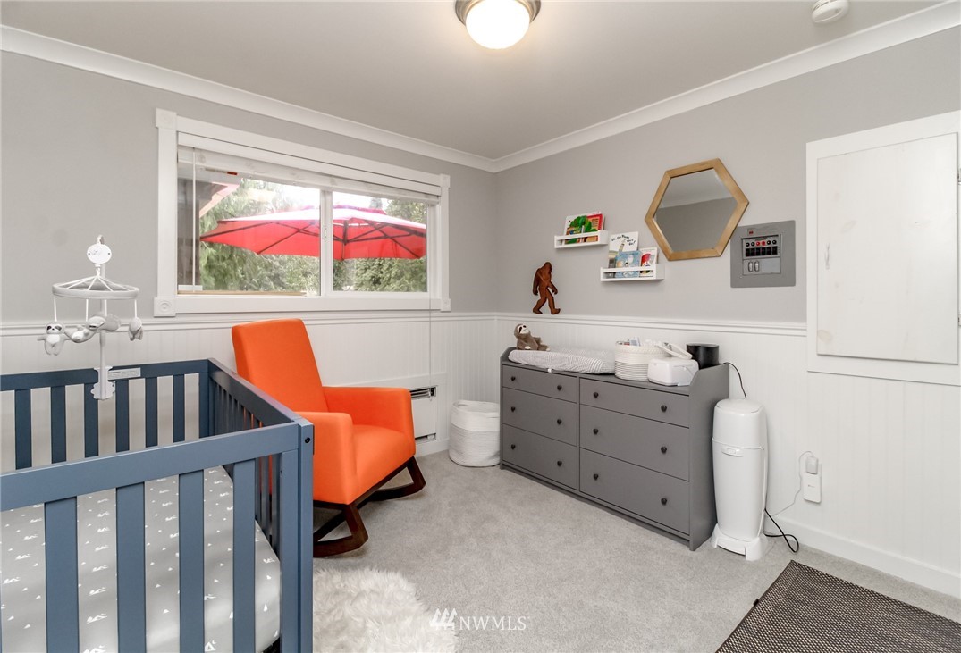 17021 Southeast Jones Road Renton, WA 98058 - Photo 13 of 27 a bedroom with furniture and a window