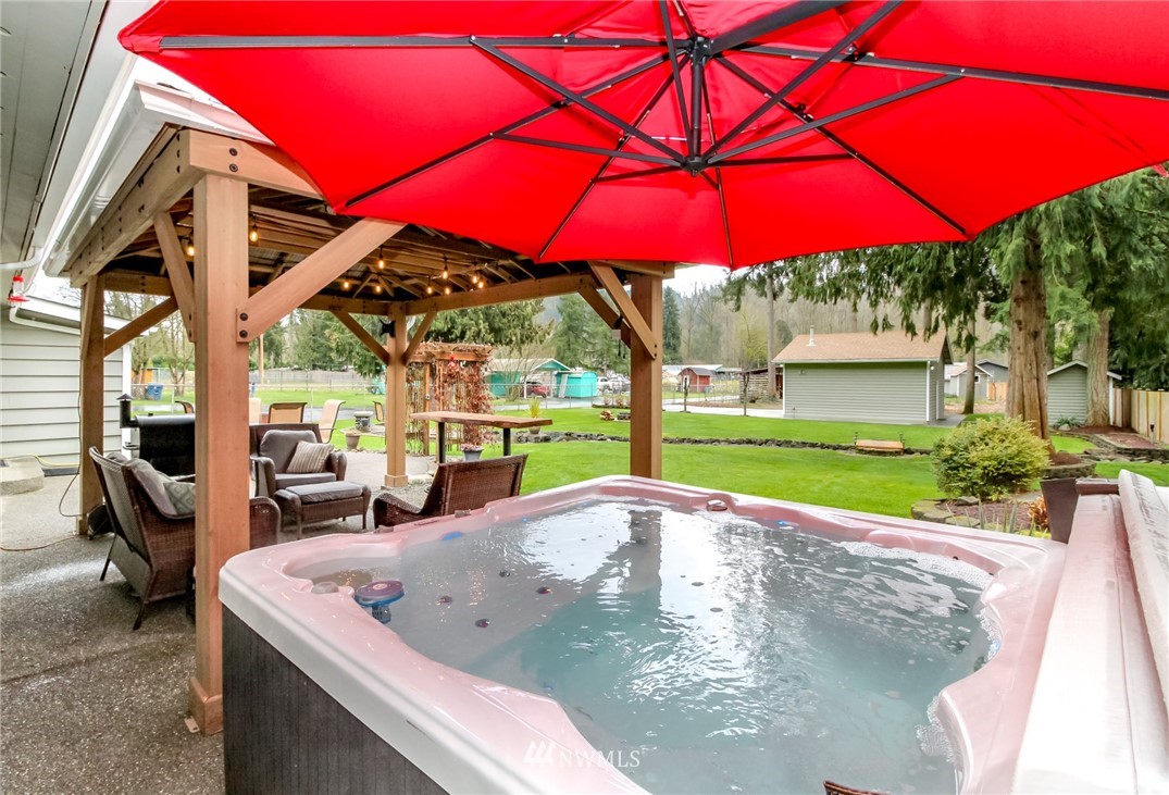 17021 Southeast Jones Road Renton, WA 98058 - Photo 20 of 27 a view of a house with a swimming pool